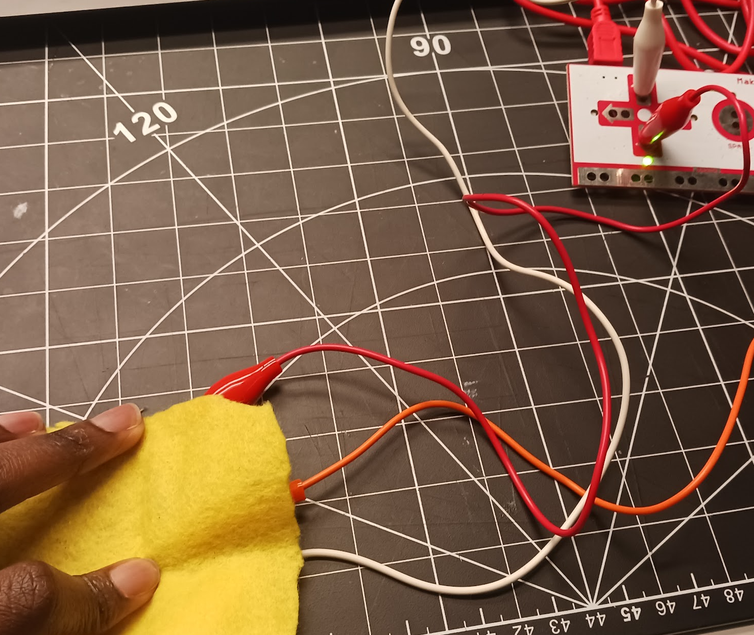 Experimenting with conductive thread, cloth and Maky-Makey